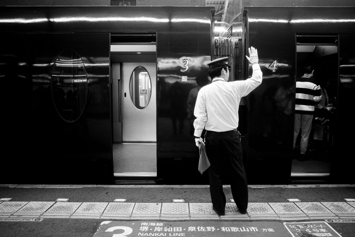 People arriving early at a station or meeting place in Japan