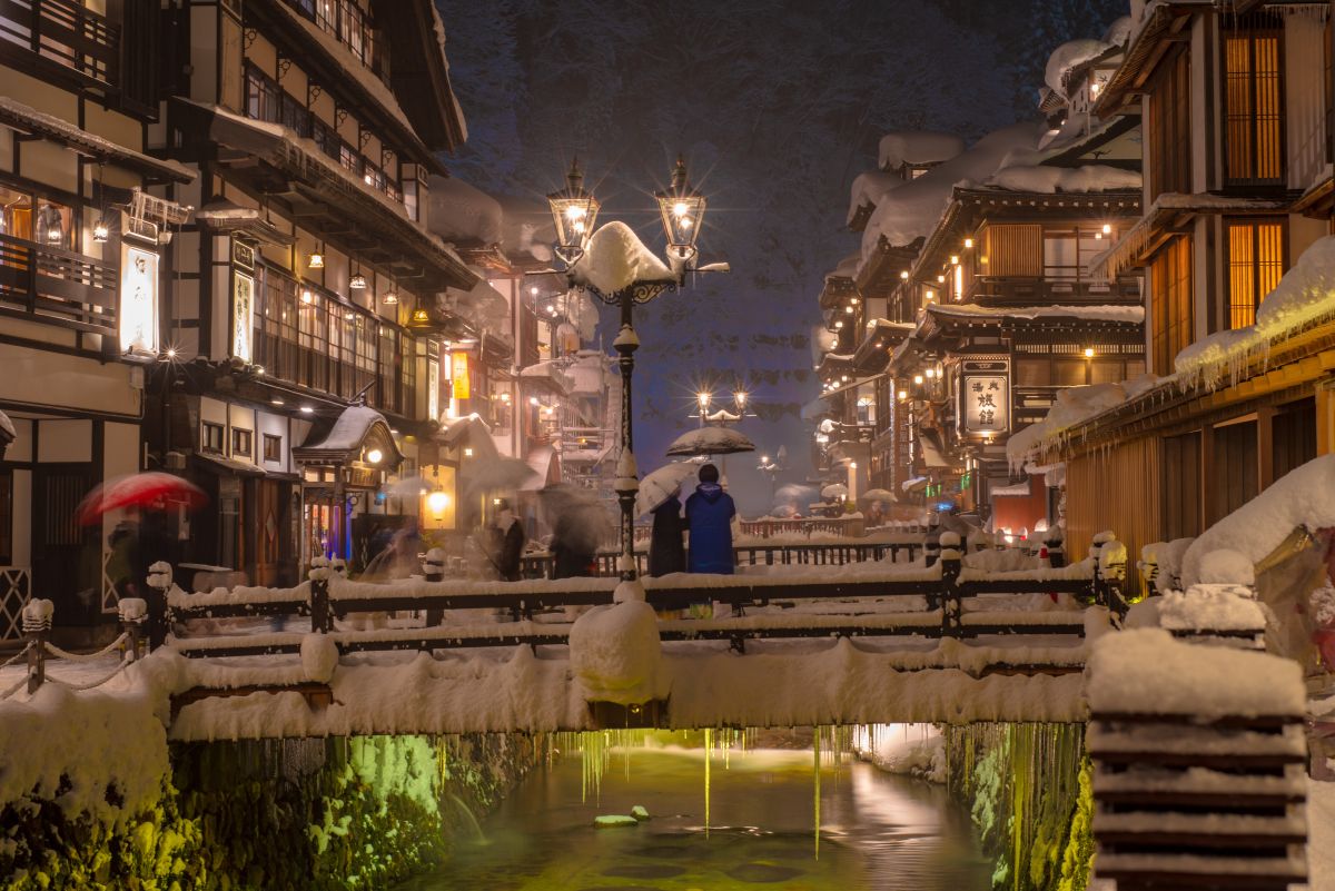 Traditional Japanese outdoor hot spring surrounded by nature