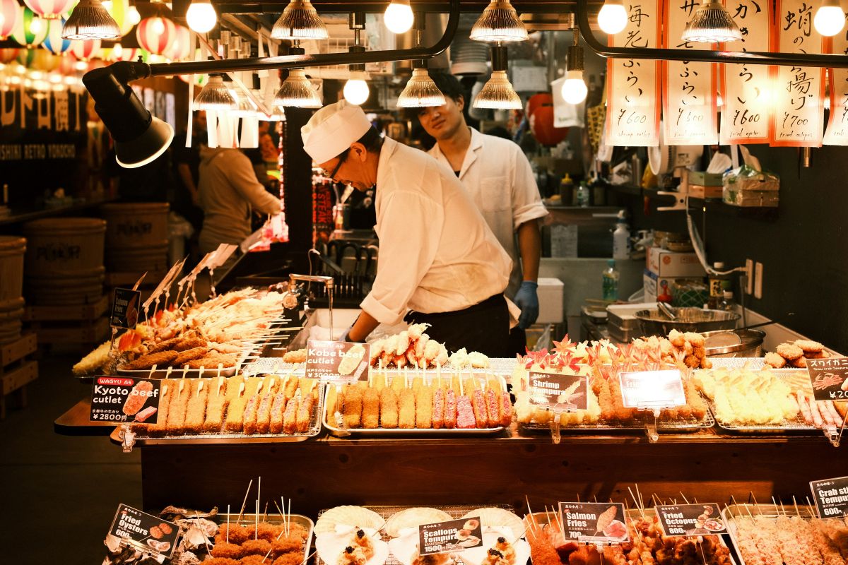 Fresh seafood displayed at a bustling local seafood market in Japan