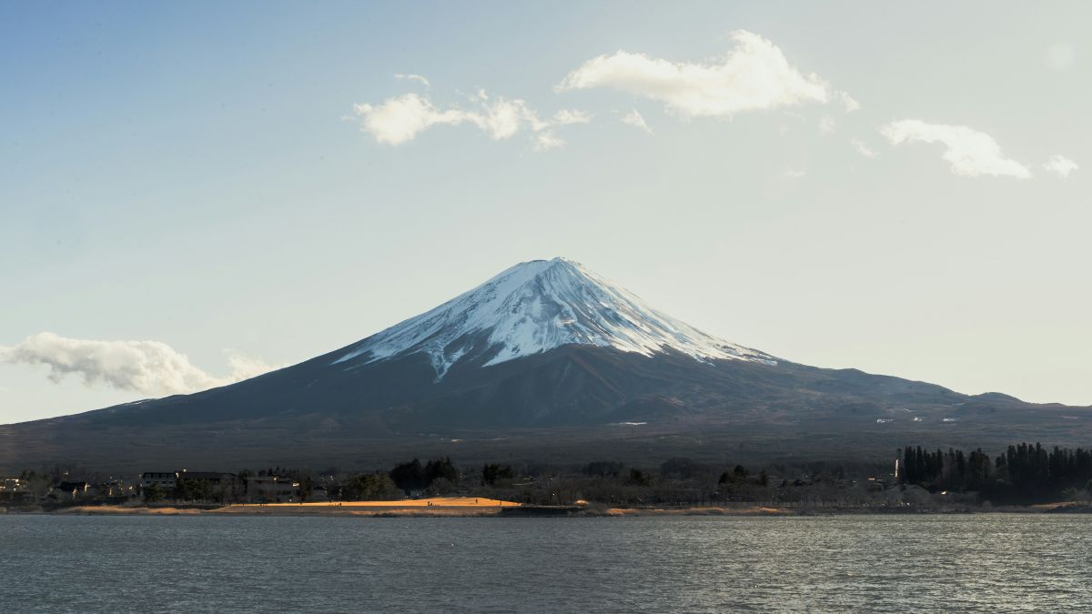 Peaceful Japanese lake with Mount Fuji reflected on the water