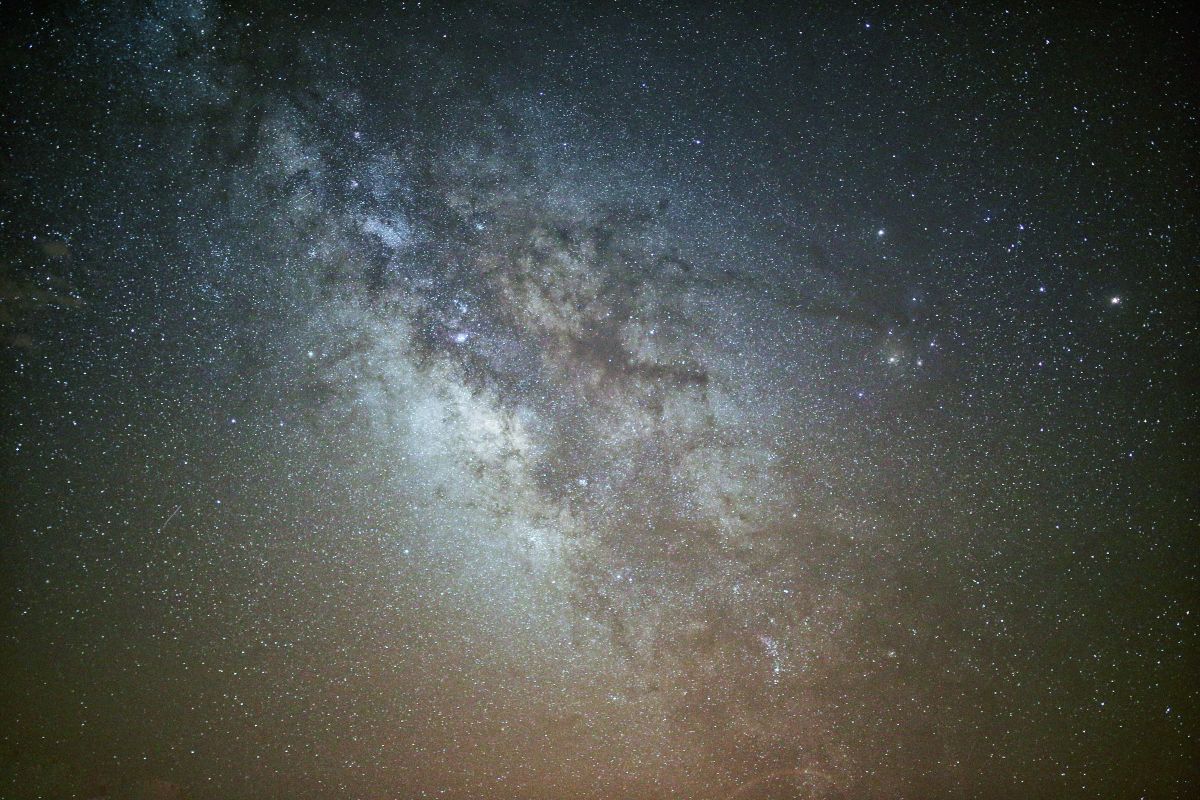 Bright Milky Way shining above the peaceful countryside in Japan