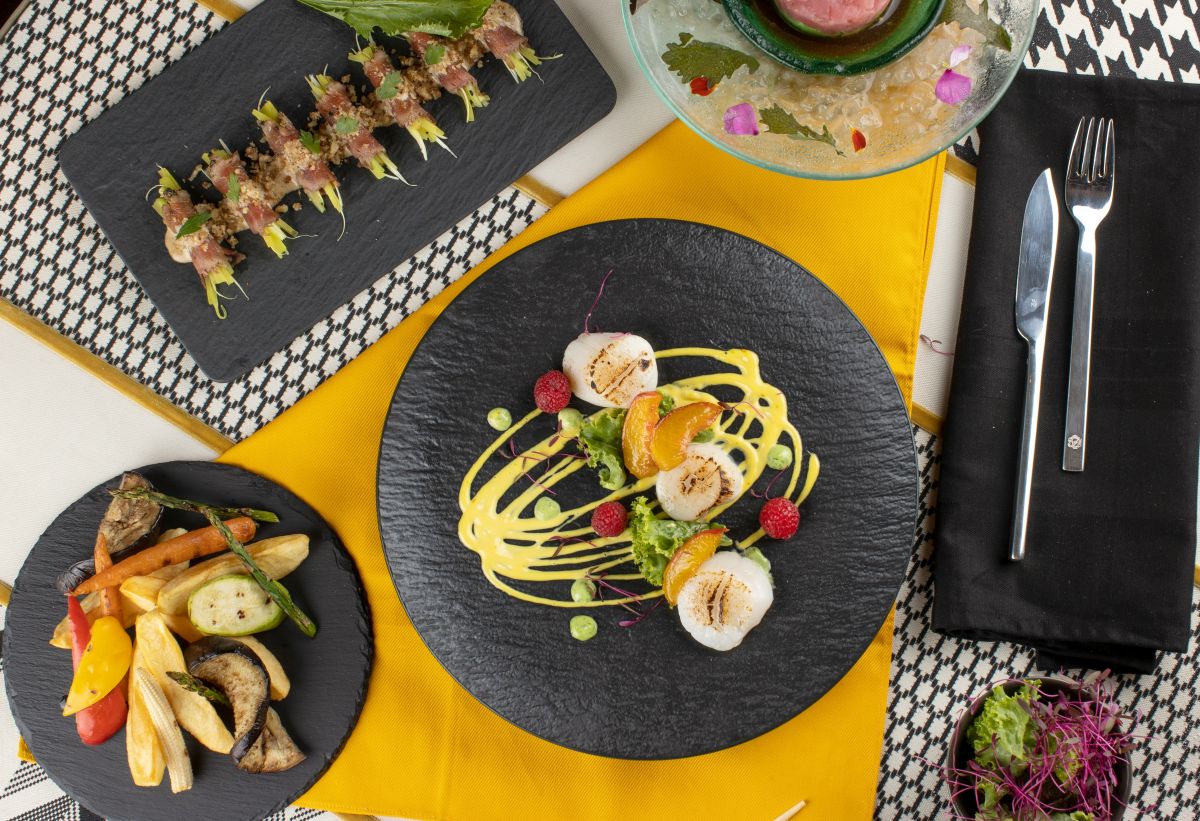 Fresh Japanese yuzu citrus displayed with traditional Japanese cuisine