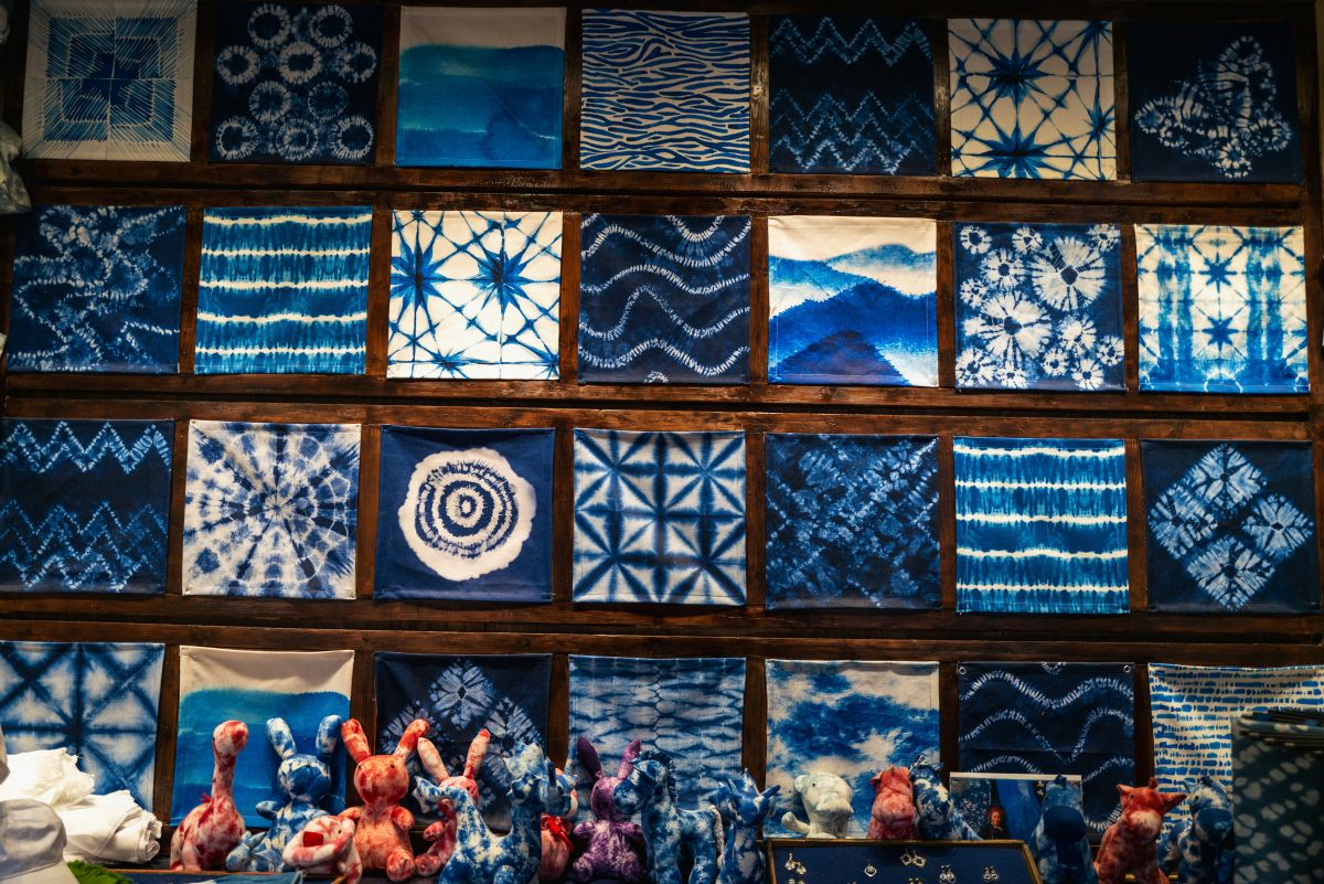 Traditional Japanese artisan creating handmade indigo-dyed fabric