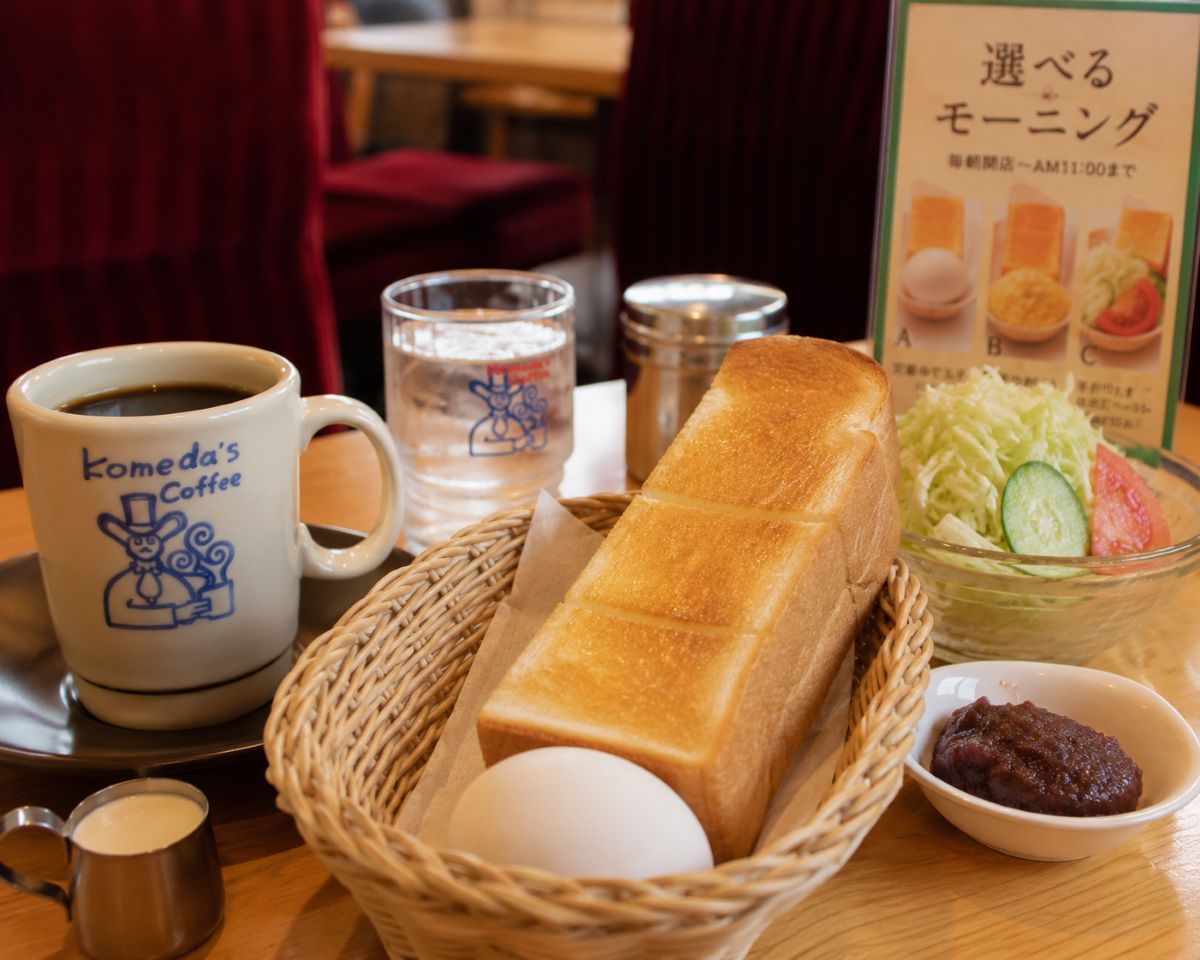 Japanese café breakfast with toast, boiled egg, and freshly brewed coffee