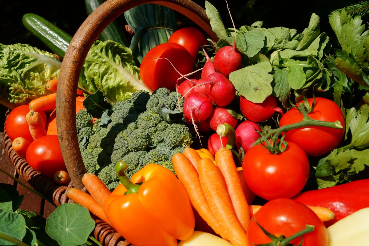 A lively Japanese morning market with fresh vegetables, seafood, and local specialties