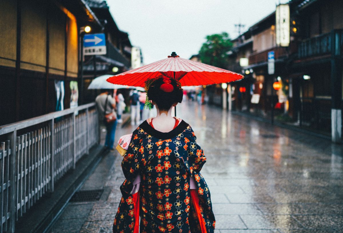 Traditional Japanese wagasa umbrella in a peaceful rainy street