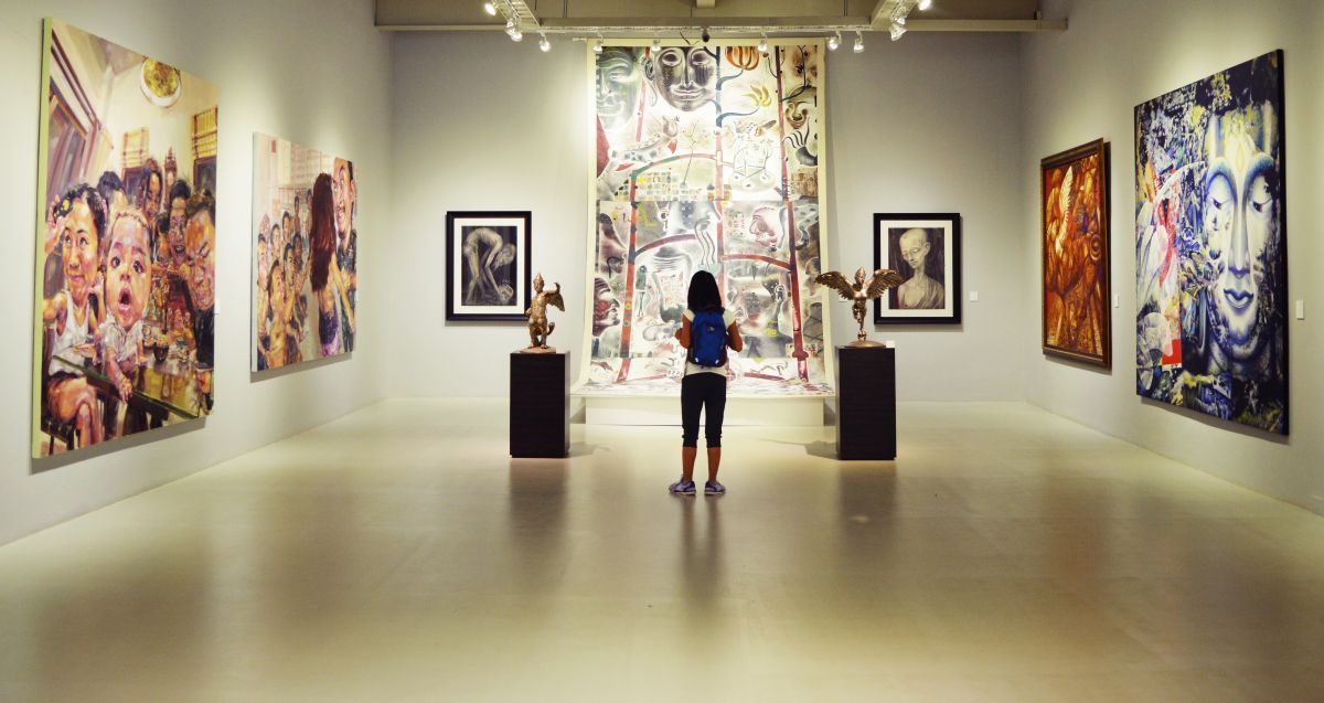 Visitors viewing exhibits inside a local museum in Japan