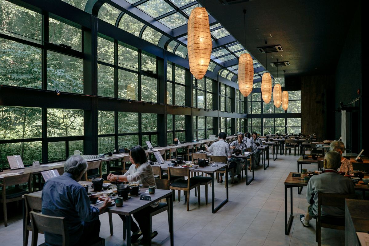 Peaceful wooden mountain café surrounded by forests and mountain scenery in Japan